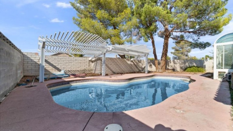 Single Story Corner Lot Home with Sunroom & Pool Pebbles Franco Top Tier Realty